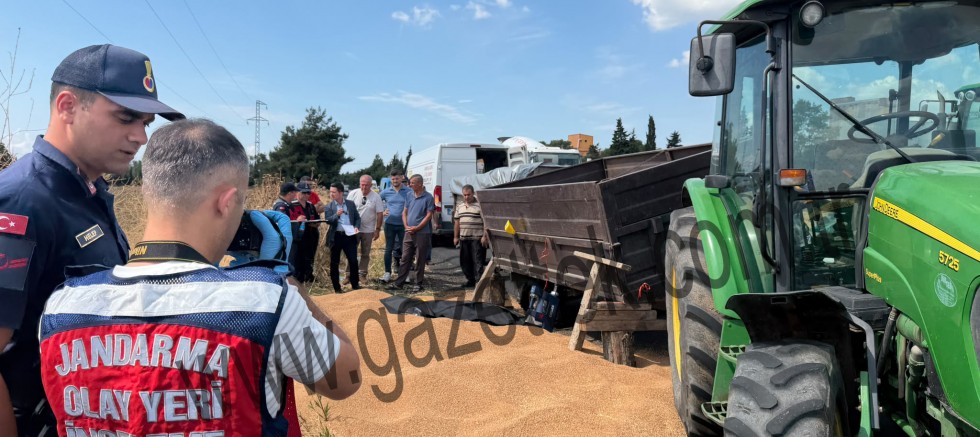 BUĞDAY YÜKLÜ RÖMORKUN ALTINDA KALAN İŞÇİ HAYATINI KAYBETTİ